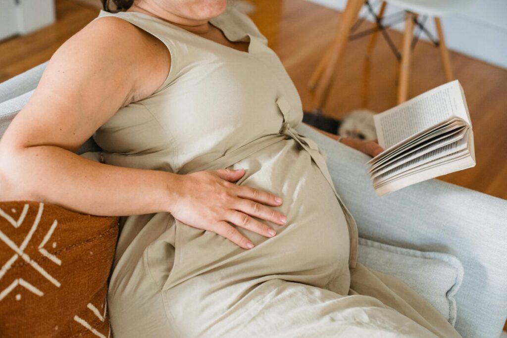 Items to skip on your realistic hospital bag checklist, like heavy books and fancy silk robes.