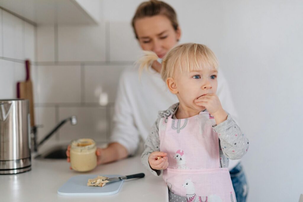 A mother using limited choice strategy to win the toddler dinner battle