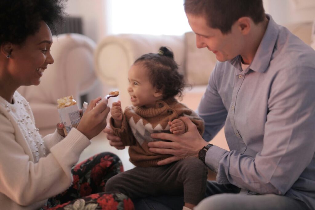 A baby refusing food suddenly and showing signs baby is full during the high chair battle
