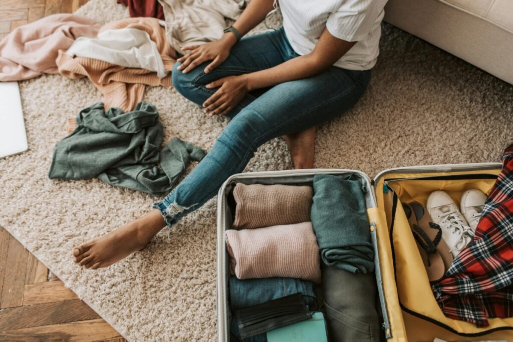 A stressed mom experiencing the 36-week panic while trying to complete her realistic hospital bag checklist.
