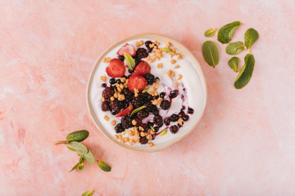 Protein berry bowl with Greek yogurt and nut butter, a perfect example of nutrient-dense toddler food.