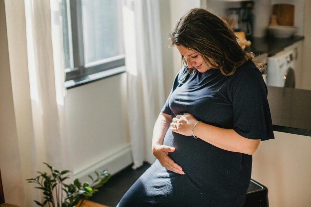 A peaceful moment of reflection and preparing your heart during the second trimester of pregnancy.