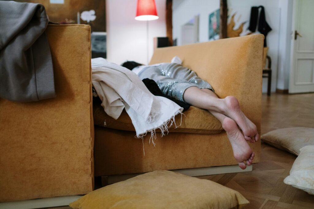 A parent managing a messy house and baby jet lag while re-establishing baby routine after travel