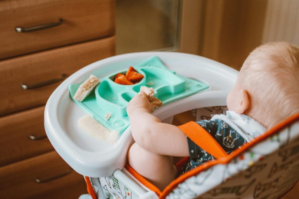 A freezer stash of homemade baby popsicles and frozen fruit purees for emergency teething relief