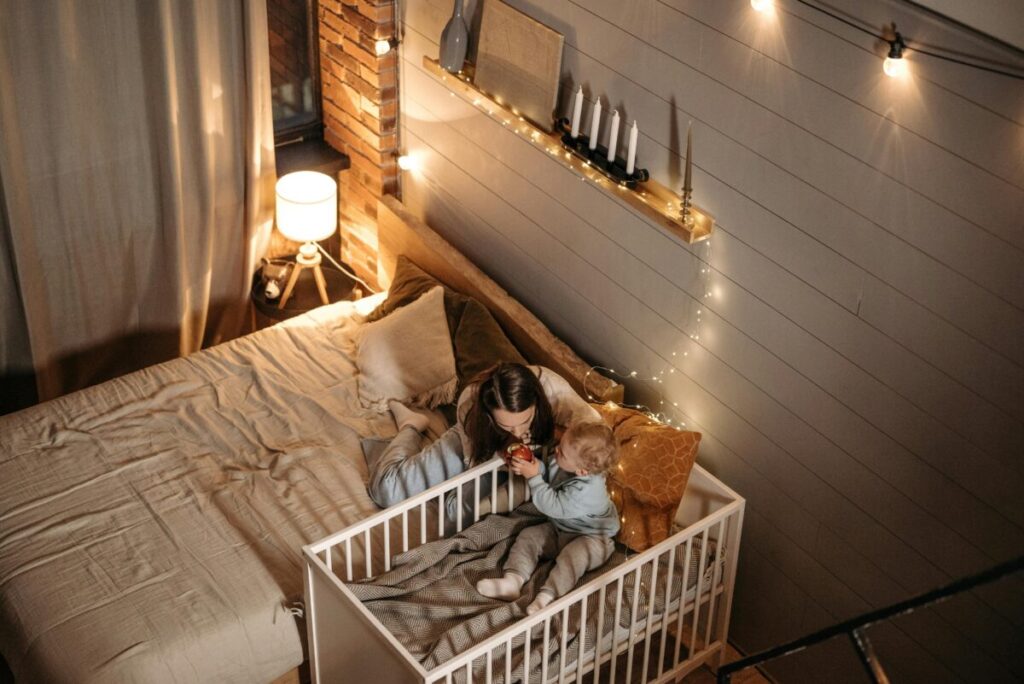 18 month old sleep regression toddler standing in crib