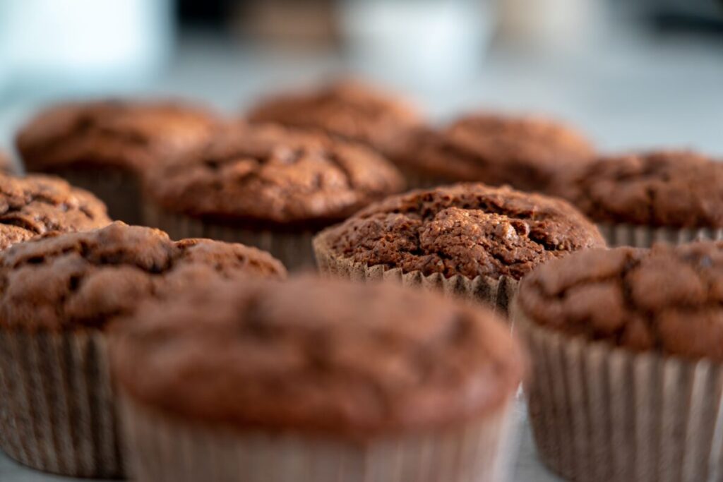 A healthy homemade muffin for toddlers, representing a nutrition hack to hide vegetables in safe foods during a food strike.