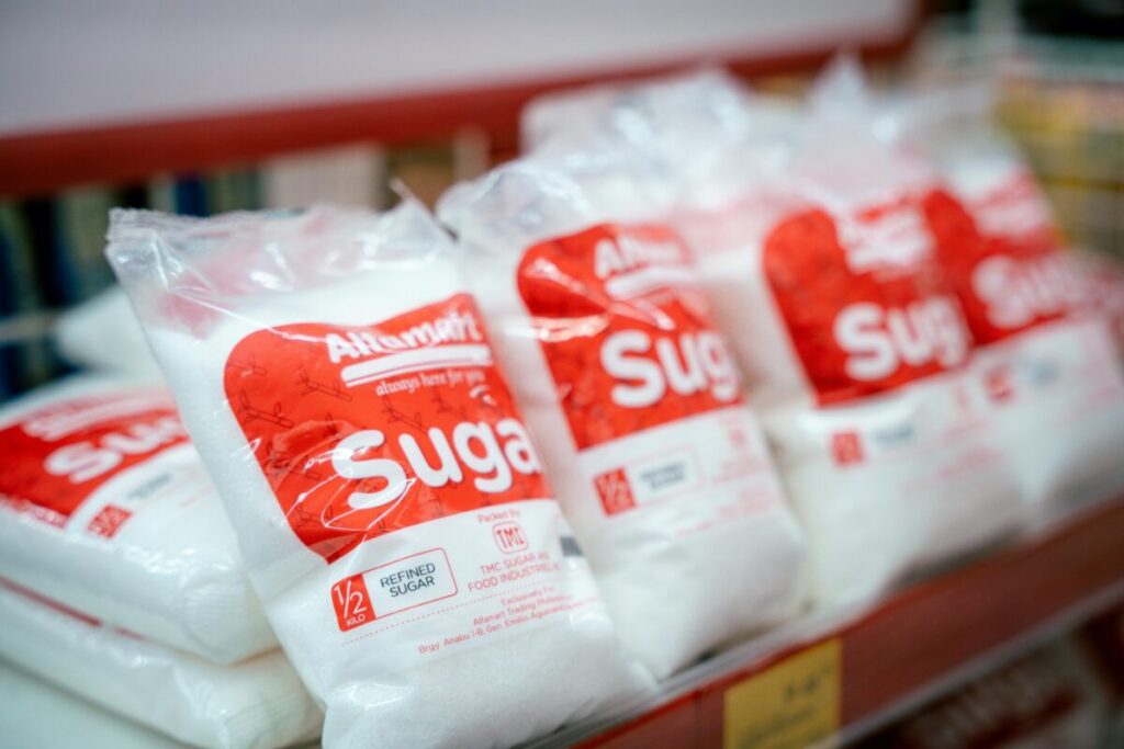 Close up of corn syrup and sugar listed as main ingredients in toddler milk