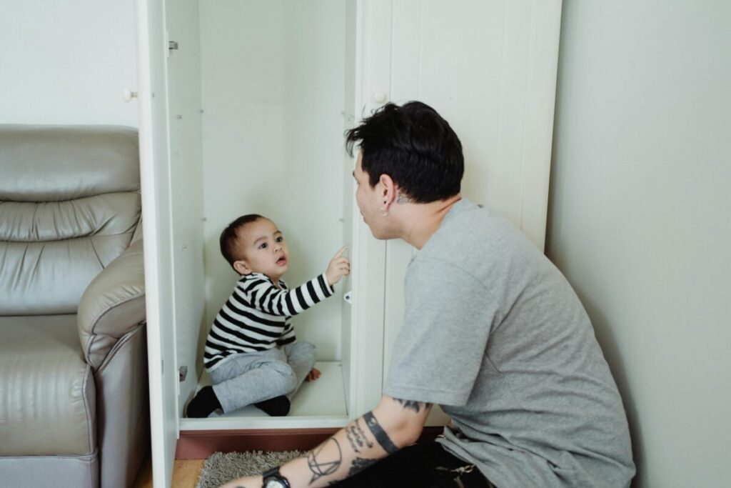 Parent calmly waiting out a toddler tantrum, reminding readers that sometimes you just have to let the wave crash