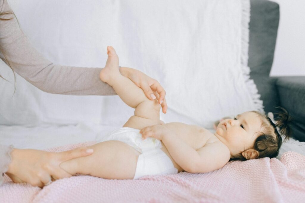 Infant tummy massage using I Love You technique for colic soothing techniques