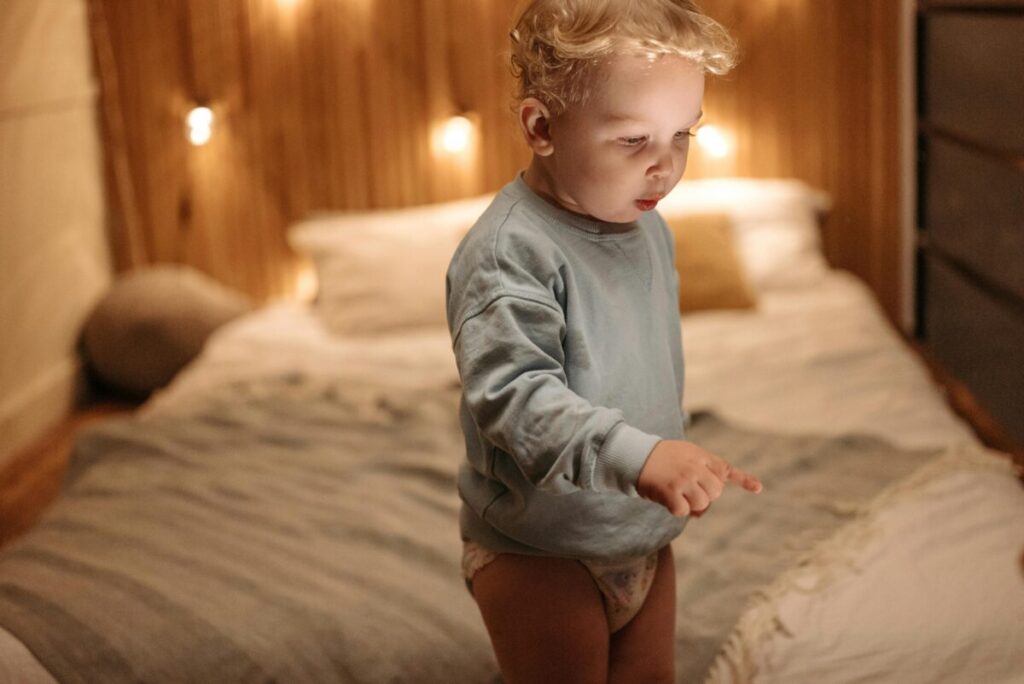 Toddler acting as a midnight visitor after the crib to bed transition