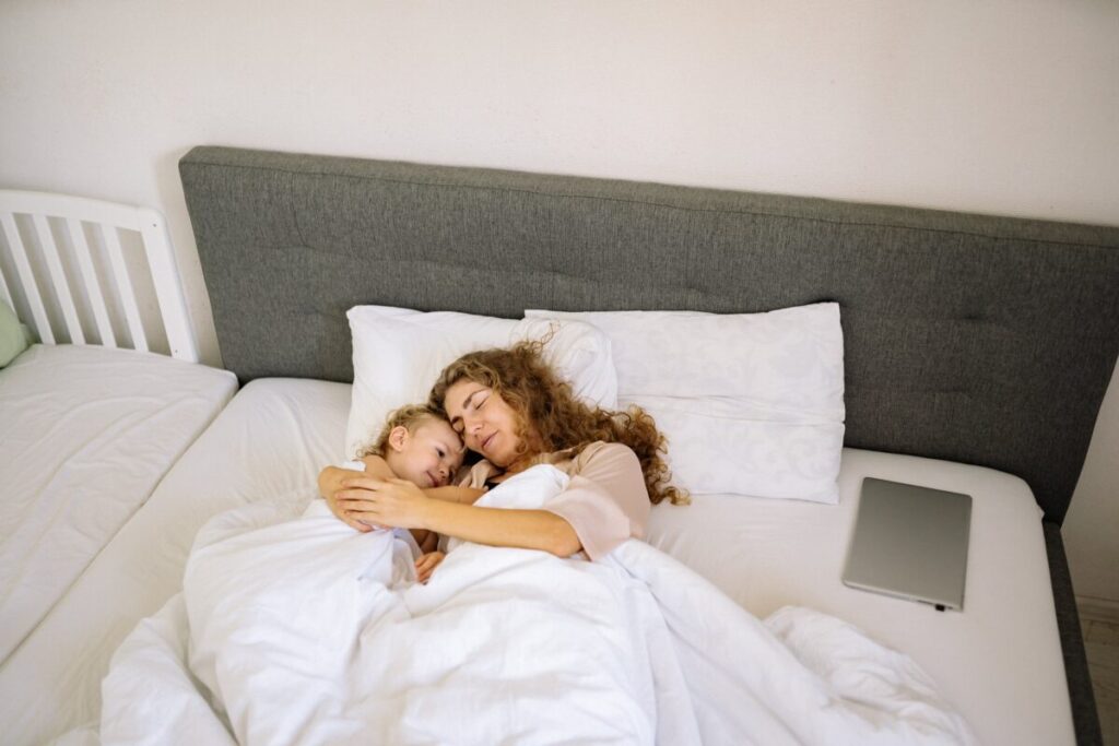 Exhausted mom waking up during the crib to bed transition period